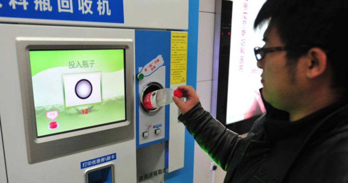 Subway riders in Beijing can pay for their trip by placing plastic bottles in a recycling bin