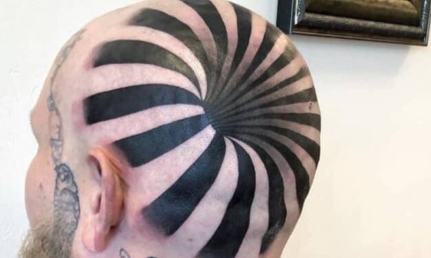 Man’s ‘optical illusion’ tattoo looks like he has a massive hole in his bald head