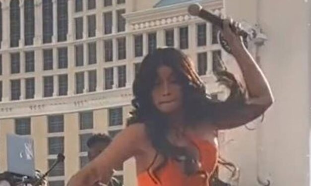 Cardi B hurls microphone at fan in Las Vegas after having drink splashed over her on stage