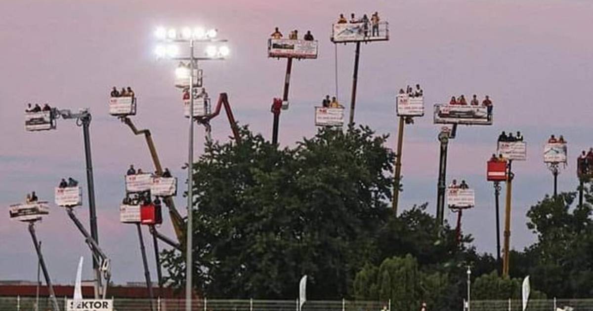 Fans Rent Cranes to Watch Car Race from Outside Arena During Pandemic