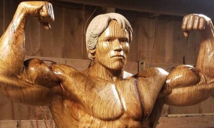 Artist Carves Incredible Life-Size Sculpture of Arnold Schwarzenegger Out of a Single Tree Trunk