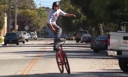 Stunt rider unofficially breaks ‘bike surfing’ world record