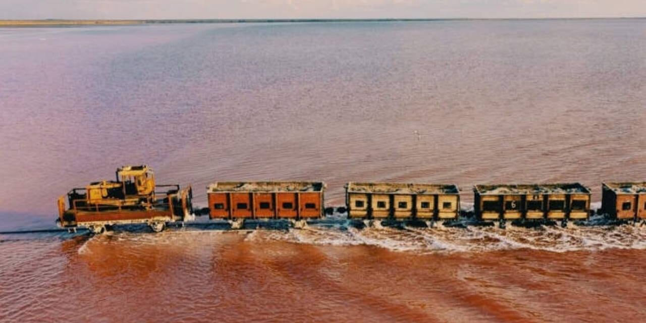 The Salt Shaker – A Freight Train That Passes Right Through a Pink Siberian Lake