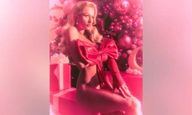 Paris Hilton strips down for racy Christmas photoshoot: ‘My presence is a present’