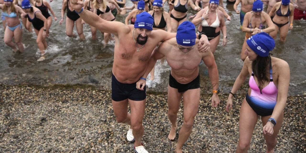 Cold-water swimmers in the Czech Republic set a new world record for the largest polar bear dip