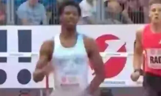 Runner wins 400m hurdle race despite having his penis constantly fall out of his shorts