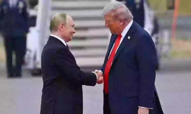 Trump greets Putin with uncomfortably long ‘yank’ handshake in Alaska