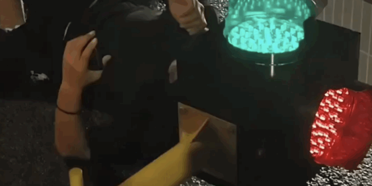 Man Gets Head Stuck in Traffic Light After Crashing into It