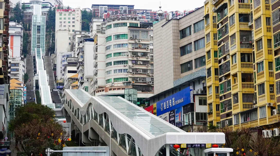 China Built the World’s Largest Outdoor Escalator, and It’s a Modern Marvel That Looks Like It Never Stops Rising Into the Sky
