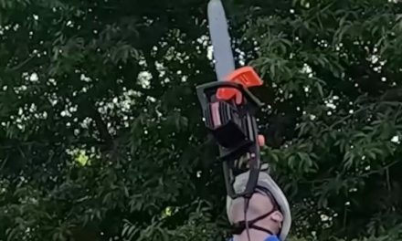 Man balances running chainsaw on his chin for over 4 minutes