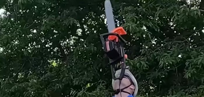 Man balances running chainsaw on his chin for over 4 minutes